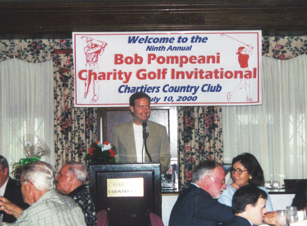 Bob Pompeani speaks at golf event